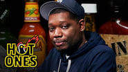 Michael Che Gs Up While Eating Spicy Wings