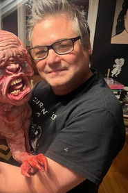 Christopher Bickel is Officer Borona Birus