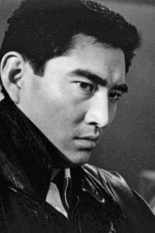 黒い指の男