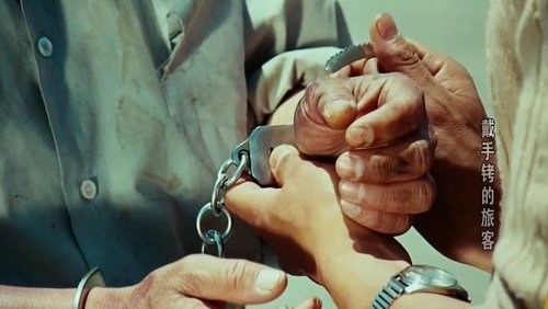 A Hand Cuffed Passenger