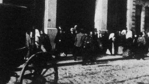 Workers Exit from the Confiança Shirt Factory