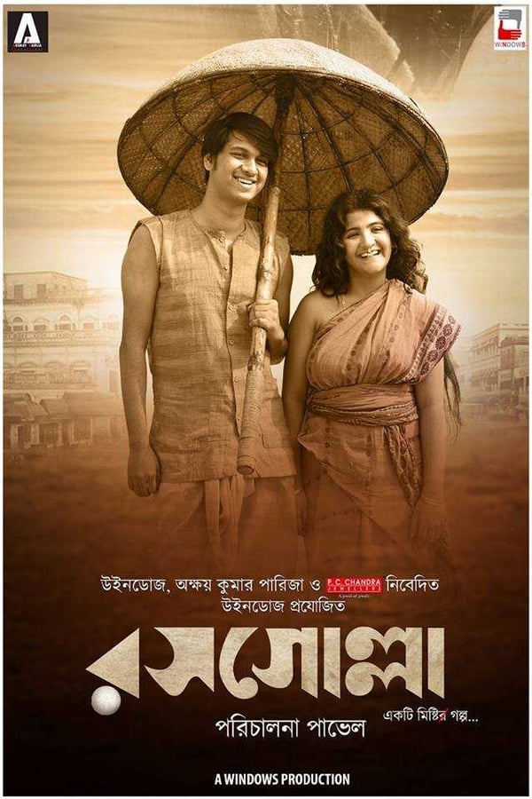 Based in the backdrop of 19th century Bengal, Rosogolla is a story of a young man with a romantic heart and brilliant mind — Nabin Chandra Das, who had set his heart on making the most delicious sweet of all time for his wife, Khirodmoni.  Rosogolla is a story of the many trial and tribulations in his journey of making something unique, of innocent love, struggle and human aspiration for novelty.