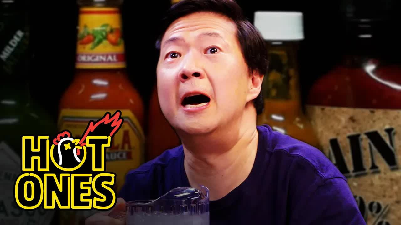 A still from Ken Jeong Performs a Physical While Eating Spicy Wings