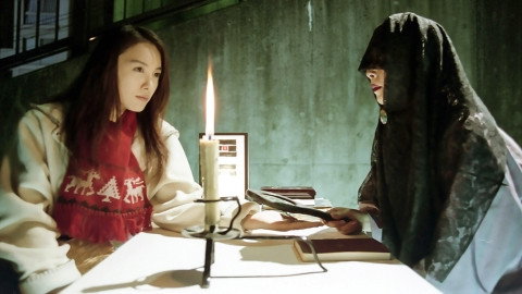 A still from Six Graves Village: Song of Mystery