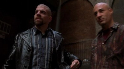 A still from A Priest, a Doctor and a Medium Walk into an Execution Chamber