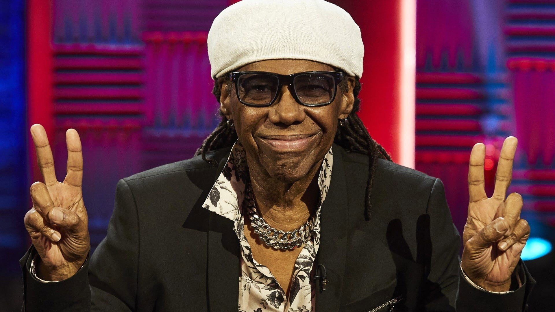 A still from Nile Rodgers, Russell Howard, Mae Muller