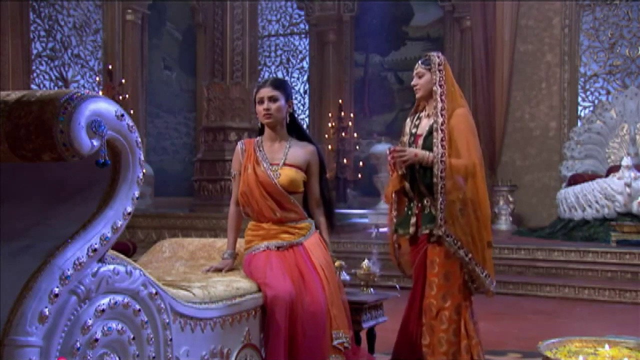 A still from Shiva's presence attracts Sati's attention