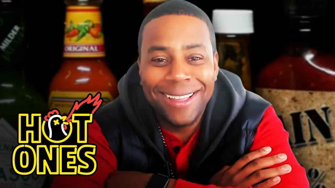 A still from Kenan Thompson Becomes a Card-Carrying Spiceman While Eating Spicy Wings