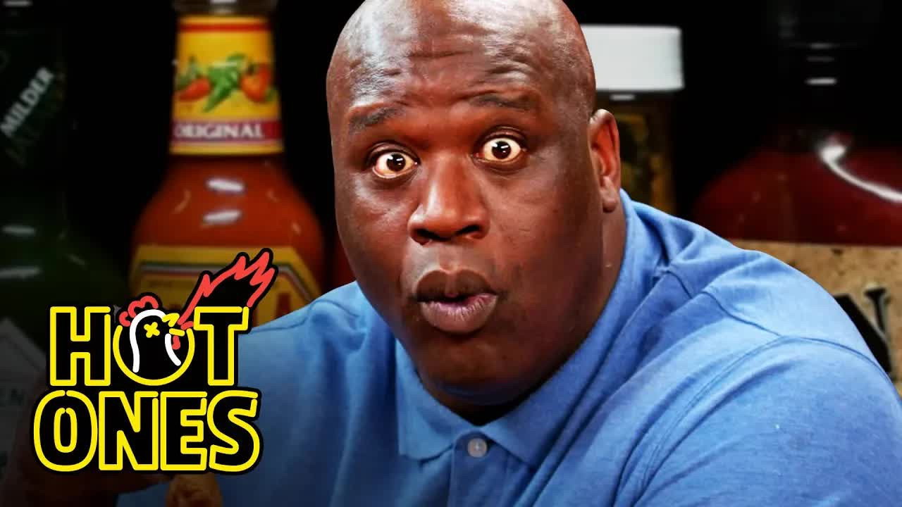 A still from Shaq Tries to Not Make a Face While Eating Spicy Wings