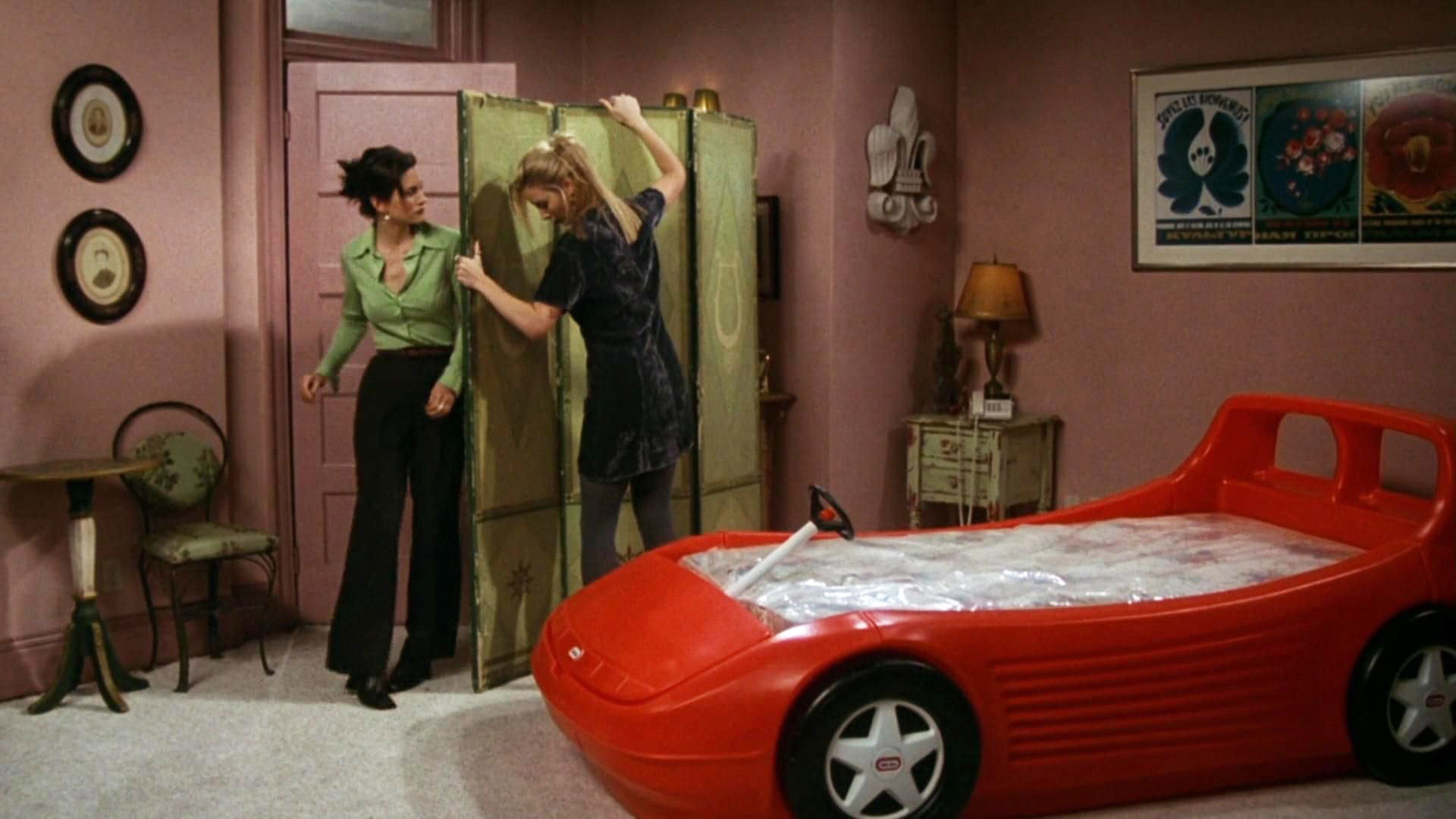 A still from The One with the Race Car Bed