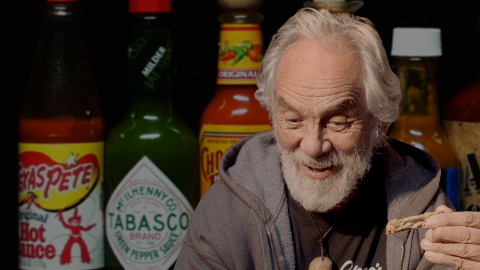 A still from Tommy Chong Talks Weed, Bernie Sanders, and Smoking with Snoop While Eating Spicy Wings