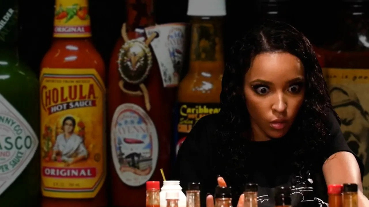 A still from Tinashe Talks NFL Dances and 2015's Sexiest Songs While Eating Spicy Wings