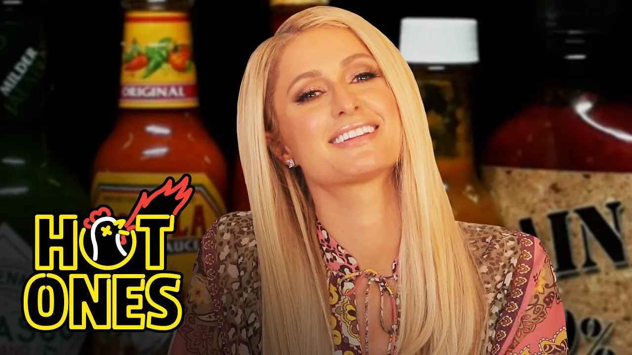 A still from Paris Hilton Says "That's Hot" While Eating Spicy Wings