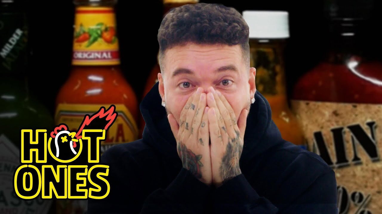 A still from J Balvin Meets the Devil While Eating Spicy Wings