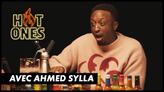 A still from Ahmed Sylla drinks sauces straight from the bottle