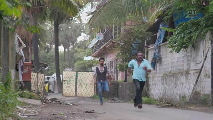 A still from Dev Interrogates Prakash