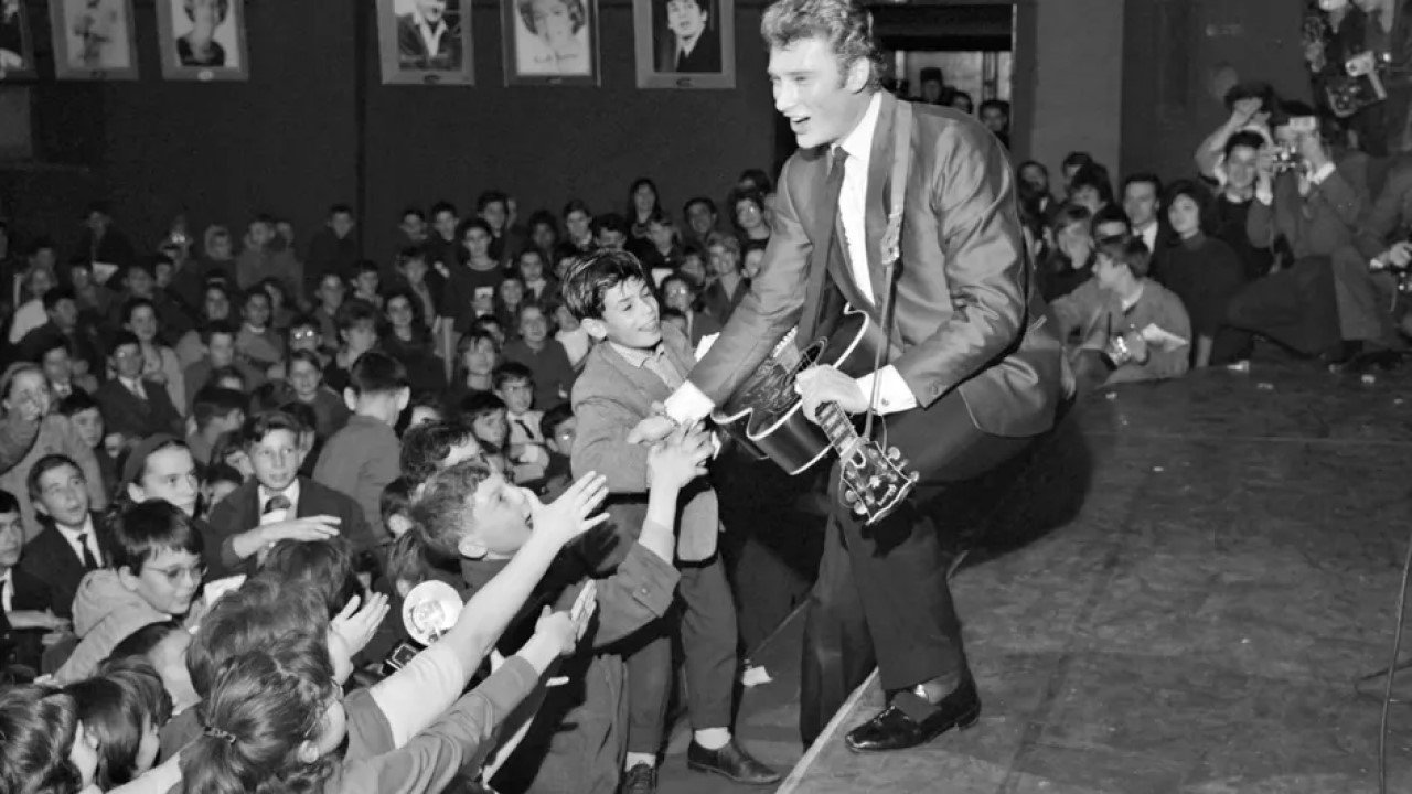 Backdrop image for movie Johnny Hallyday - Un soir à l'Olympia