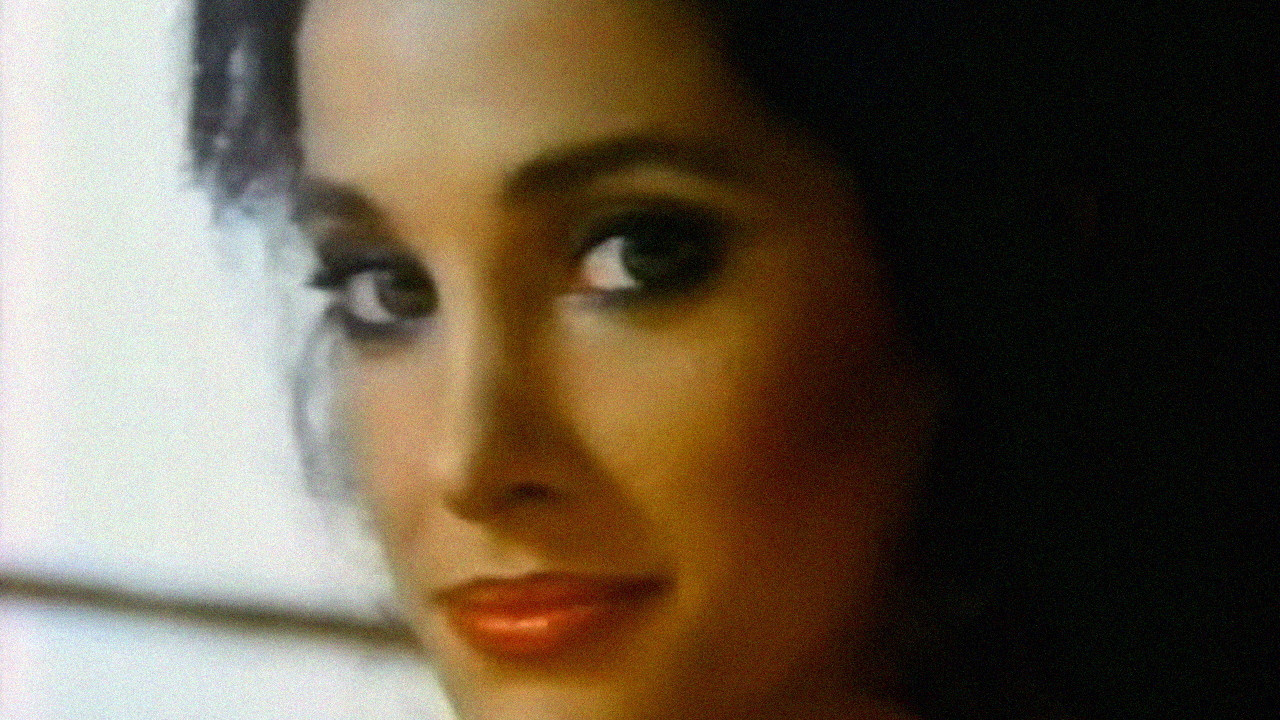 Backdrop image for movie She's Dressed to Kill