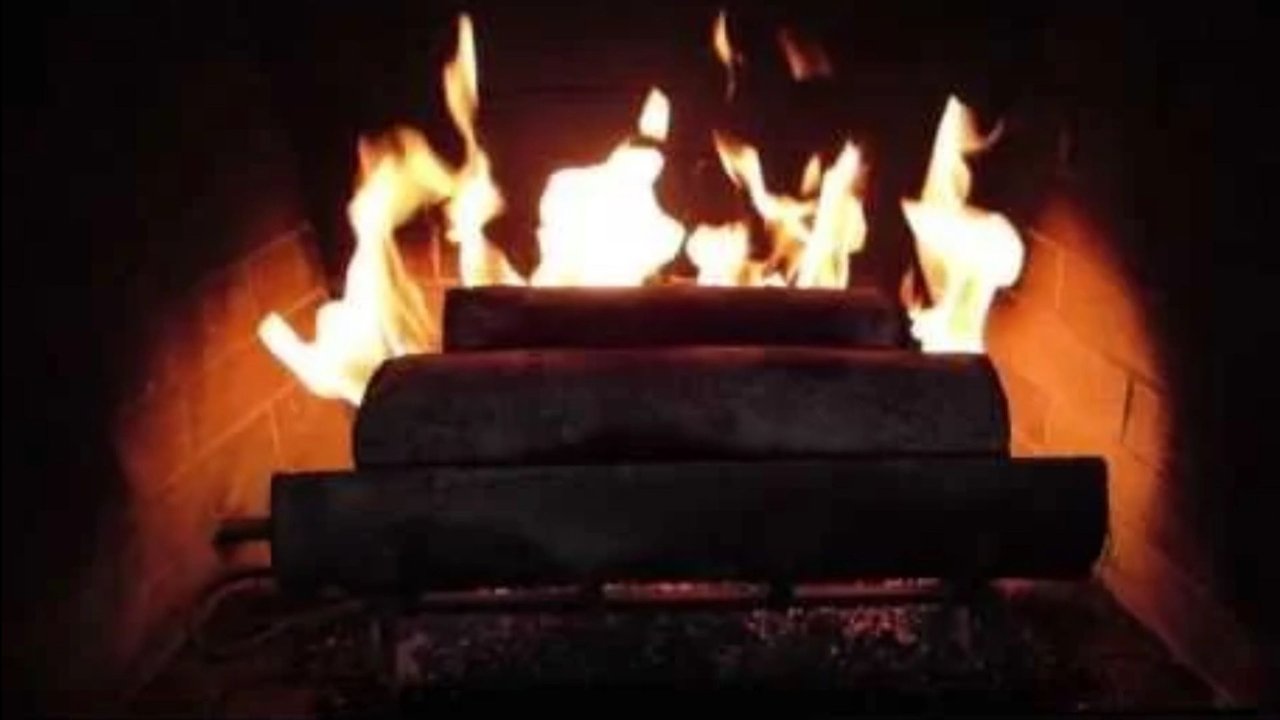 Backdrop image for movie Yule Log with Christmas Music and Loud Family Fighting