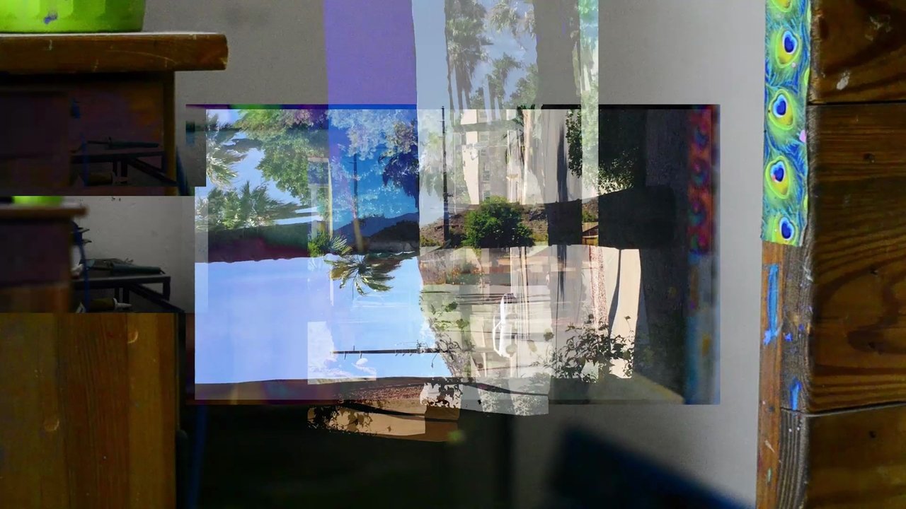 Backdrop image for movie Hiding Under a Copy of the Strokes' Single 'Under Cover of Darkness'