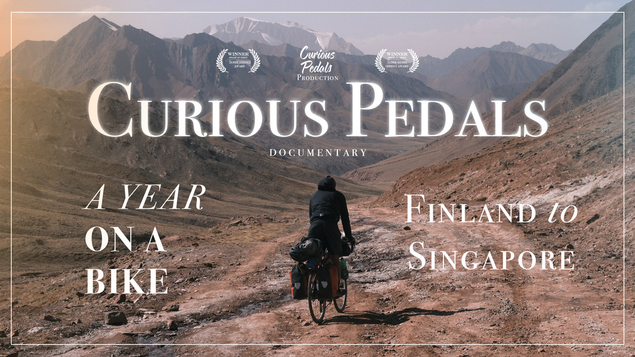 Backdrop image for movie Curious Pedals - Cycling from Finland to Singapore