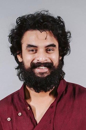 Portrait of Tovino Thomas