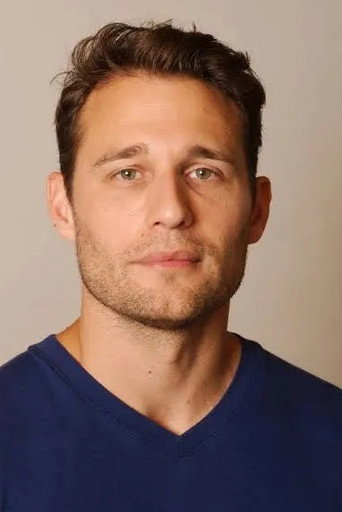 Portrait of Travis Oliver