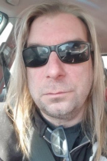 Portrait of Brett Kelly