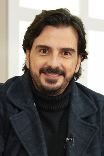 Portrait of Carlos Camacho