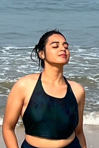 Neha M