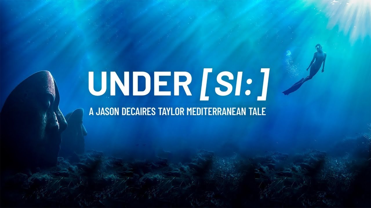 UNDER [SI:]