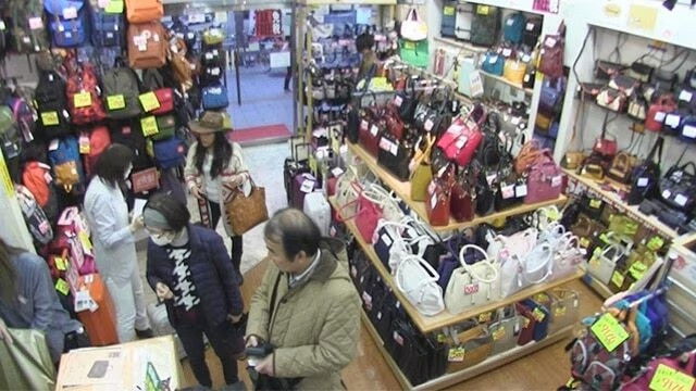 Spring at a Bag Store on the Street Corner