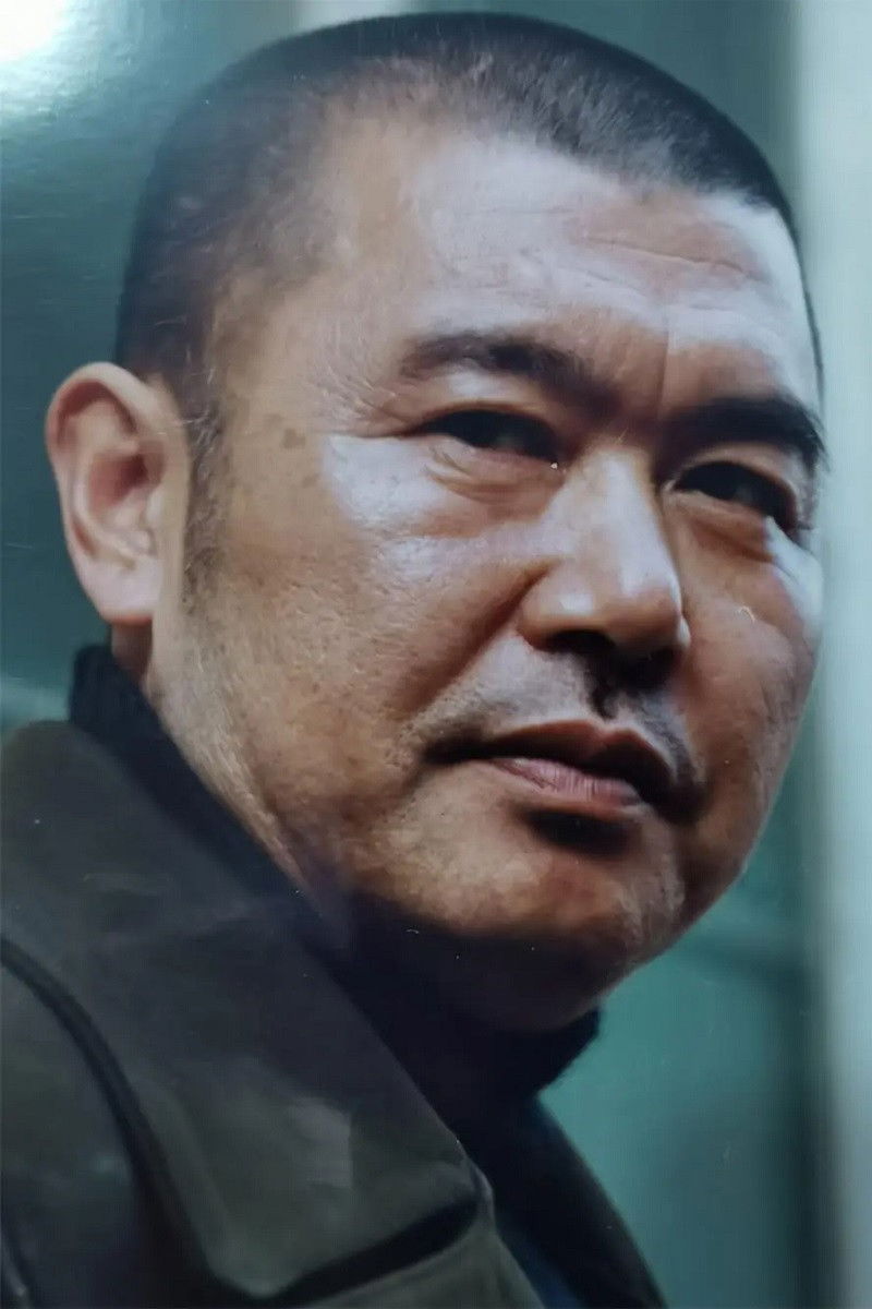 et billede af Hongguang Wang