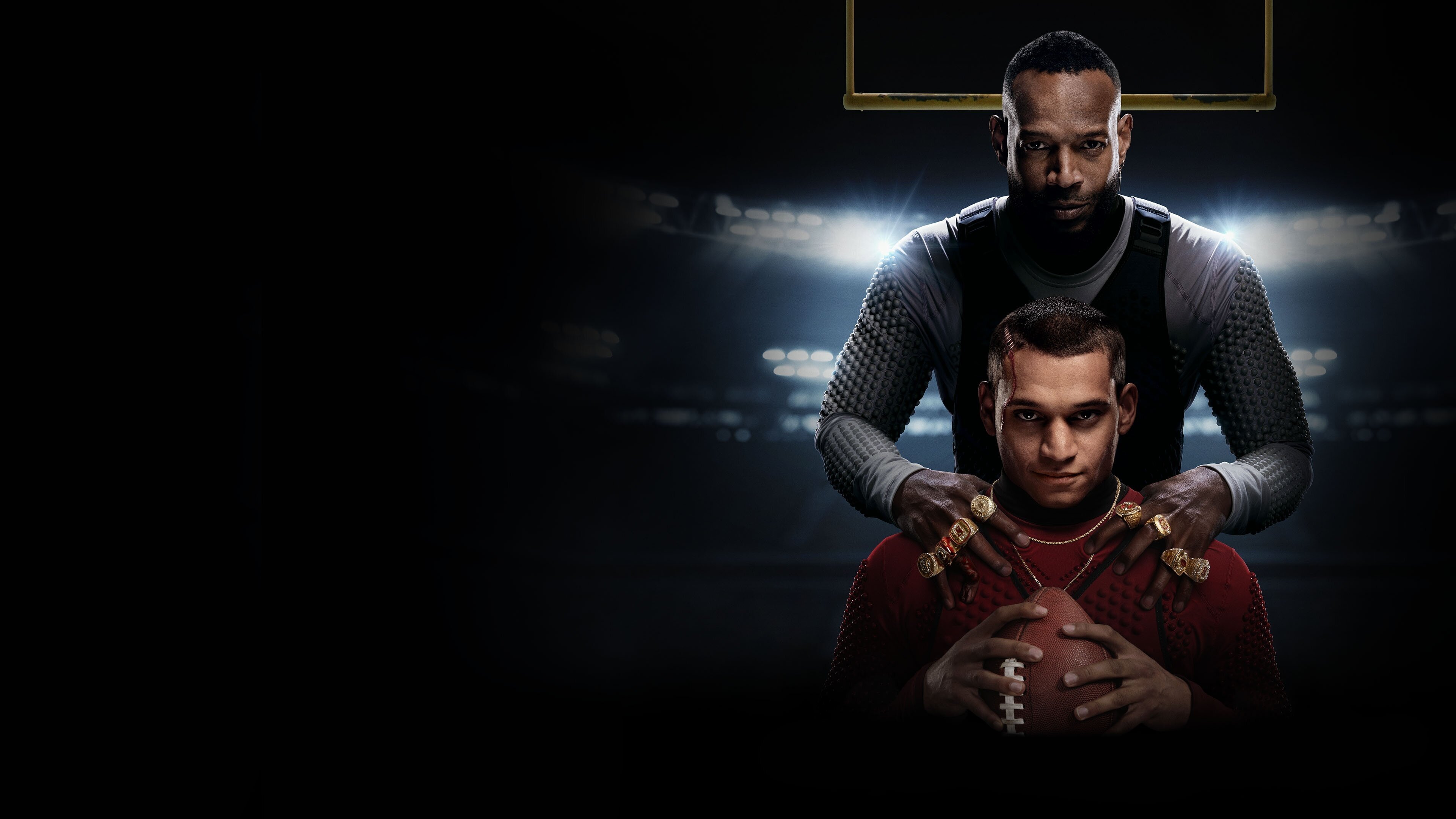 Caption: a couple of men standing next to each other in front of a basketball hoop