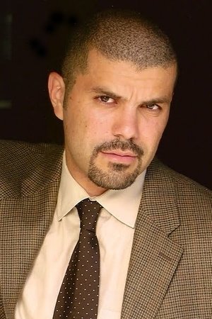 Herman Chavez as Undercover Domino Player