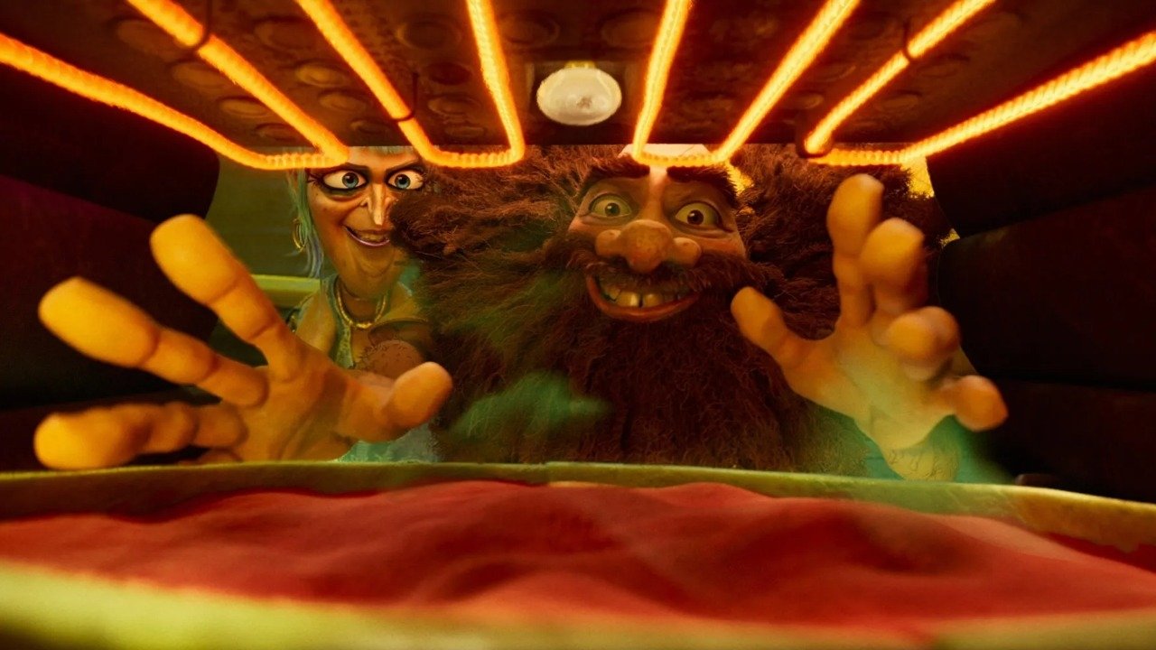 Caption: the three muppets in the movie the muppets