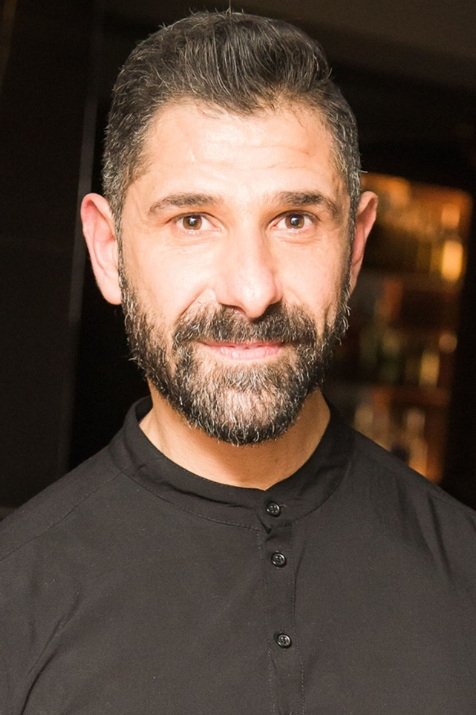 et billede af Dimitris Kampolis