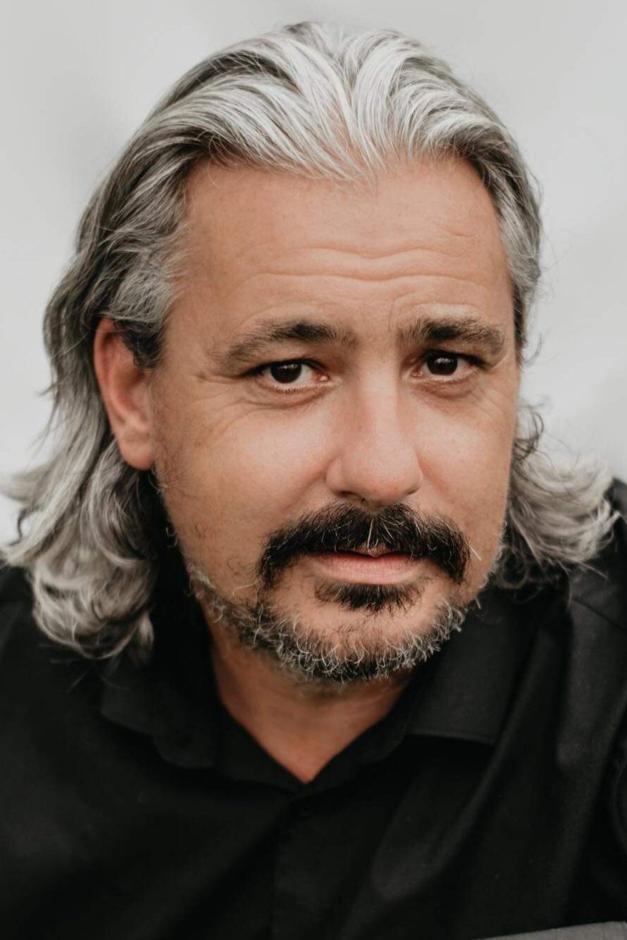 et billede af John Alan Roberts