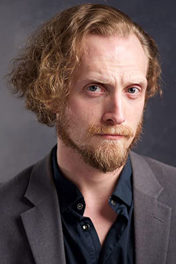 et billede af Tavis L. Baker