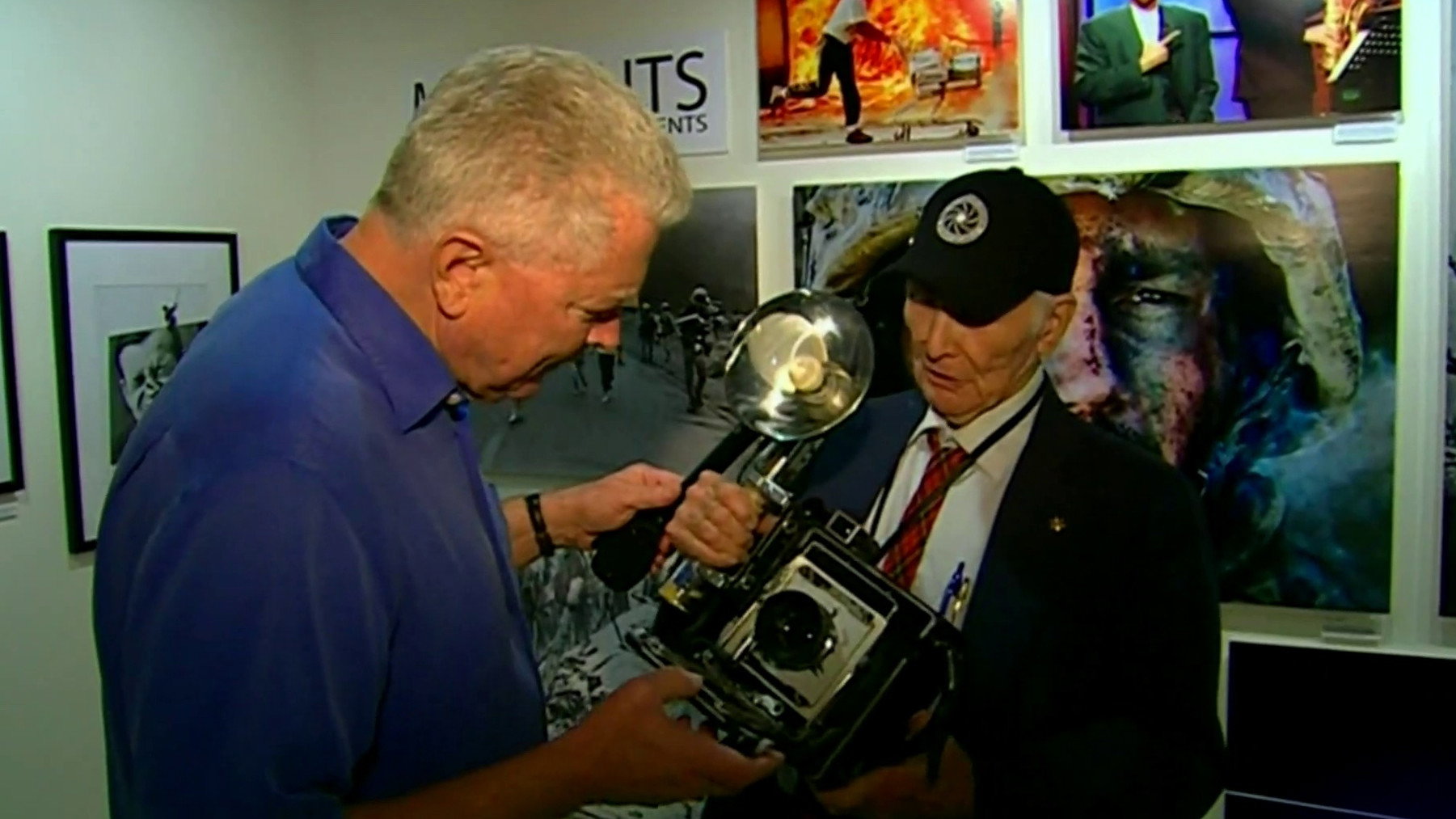S18E13 · Press Photographers