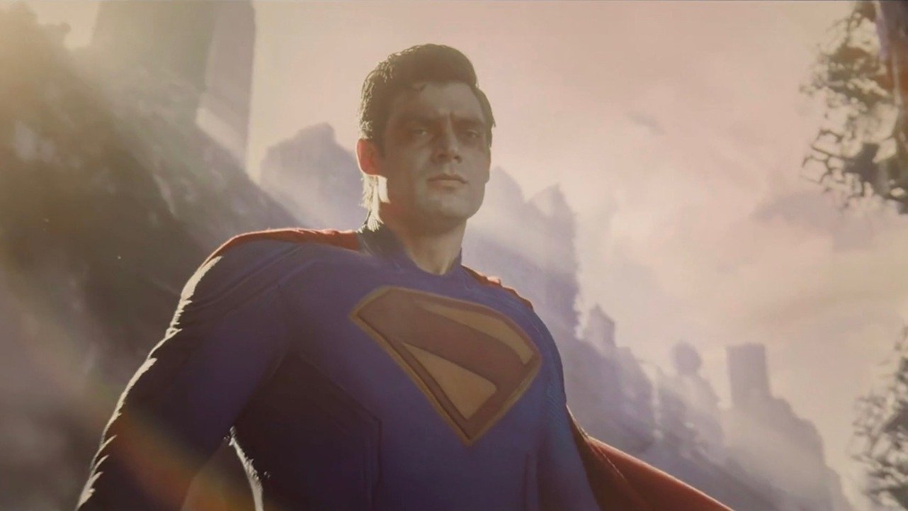Caption: a man in a superman suit standing in front of a mountain