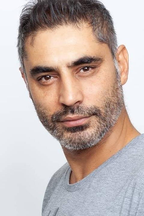 et billede af Bertan Dirikolu