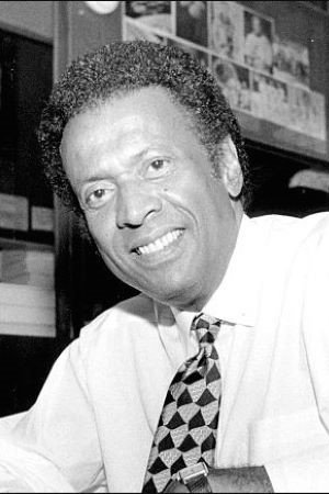 John Johnson as Elaine's Patron