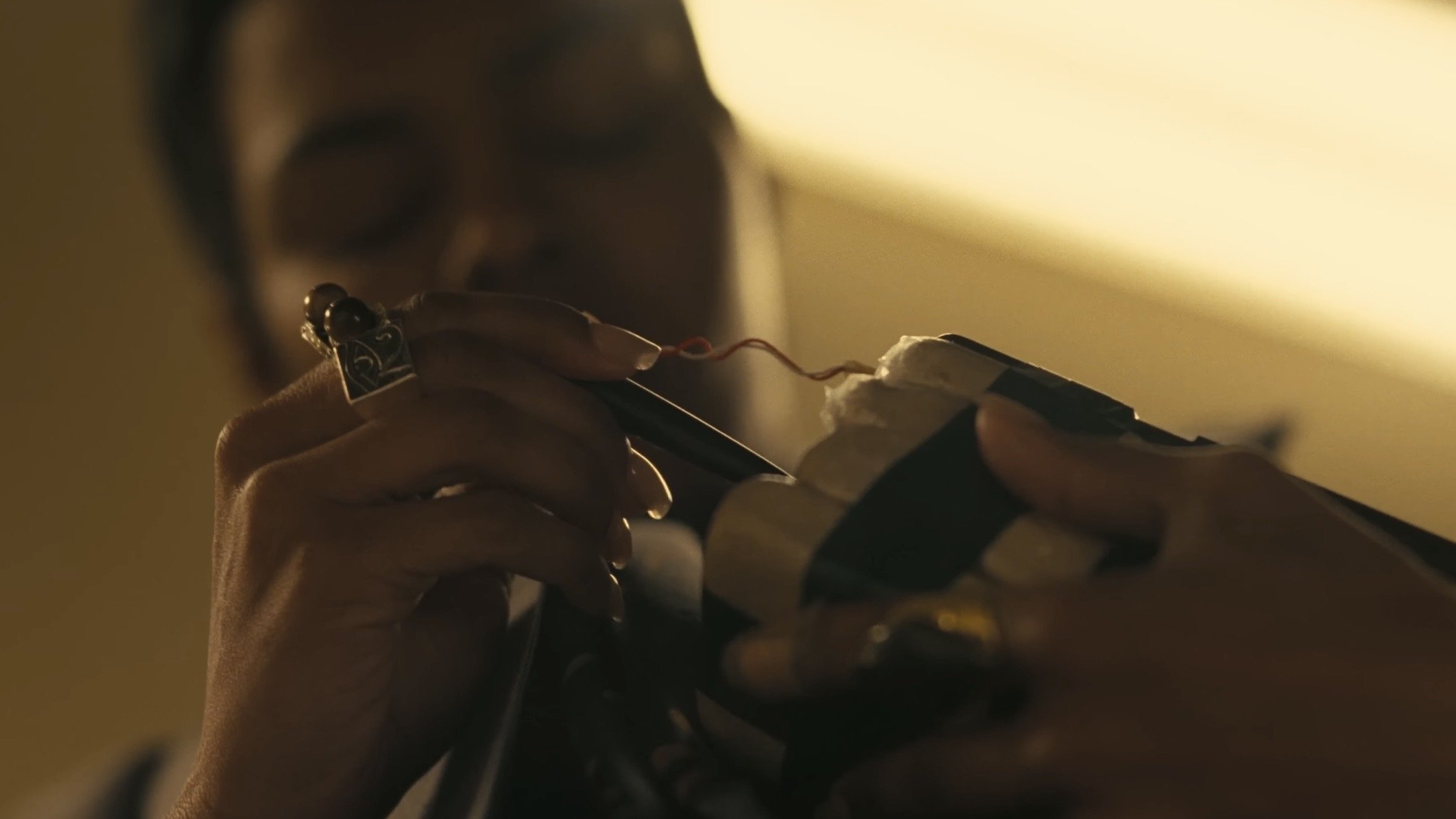 Caption: a close up of a person holding a cell phone