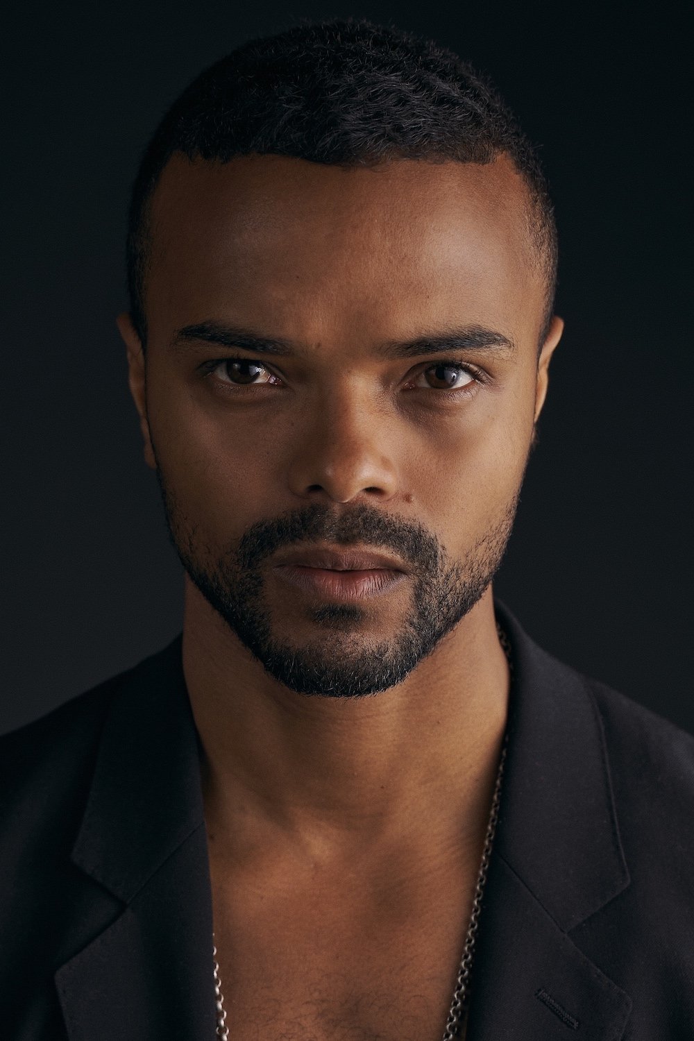 Profile Eka Darville with character Malcolm Ducasse