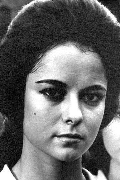 Maggie de la Riva as Mrs. Cervantes