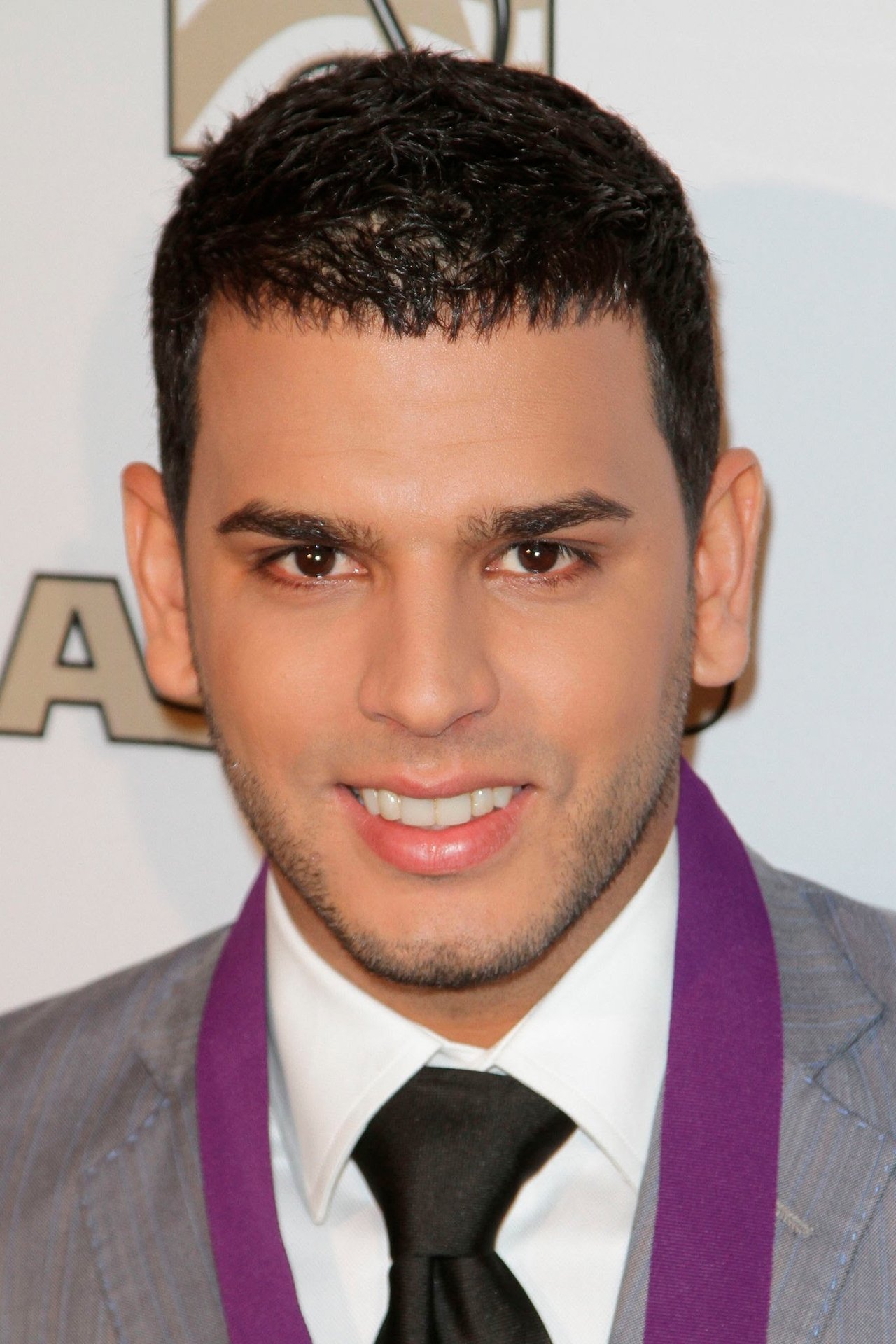 Tito El Bambino's picture in the cast