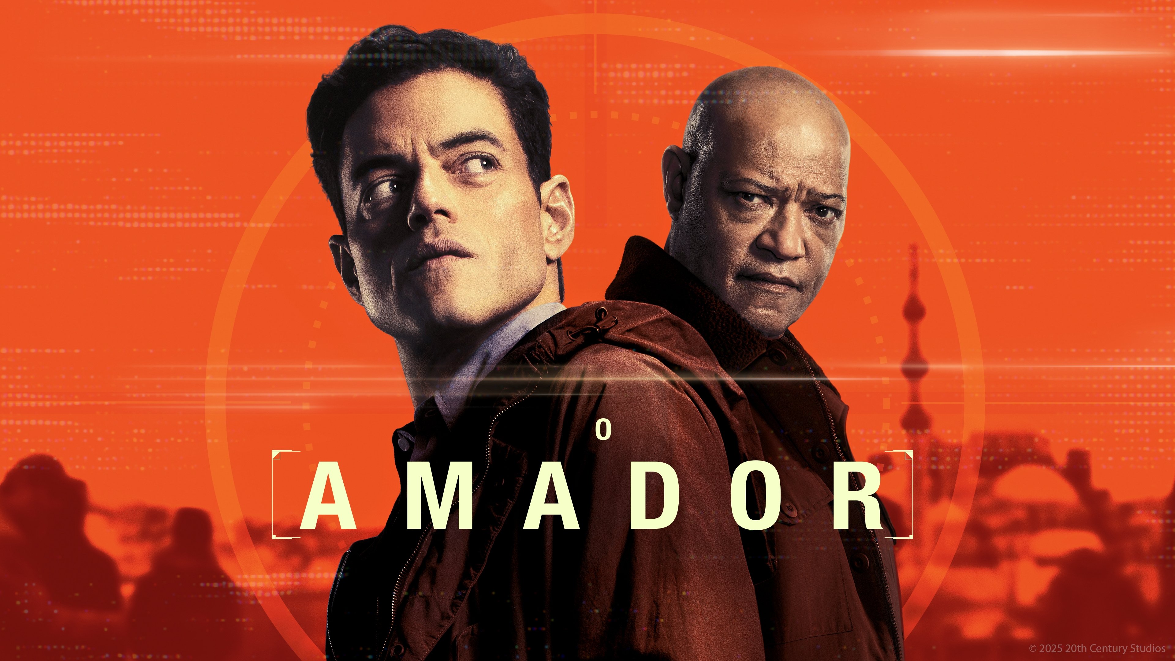 Caption: two men standing next to each other in front of an orange background