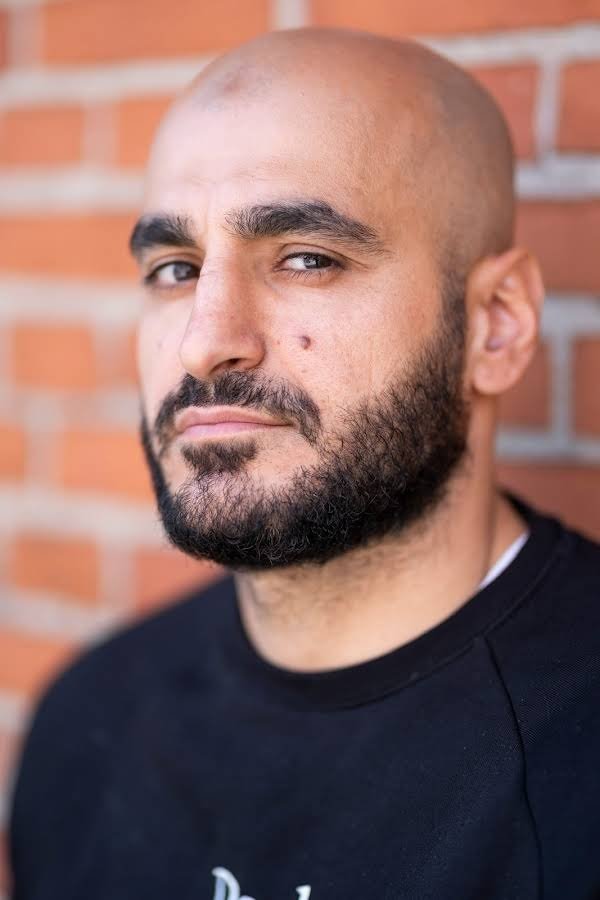 Kamal Mustaffai's picture in the cast