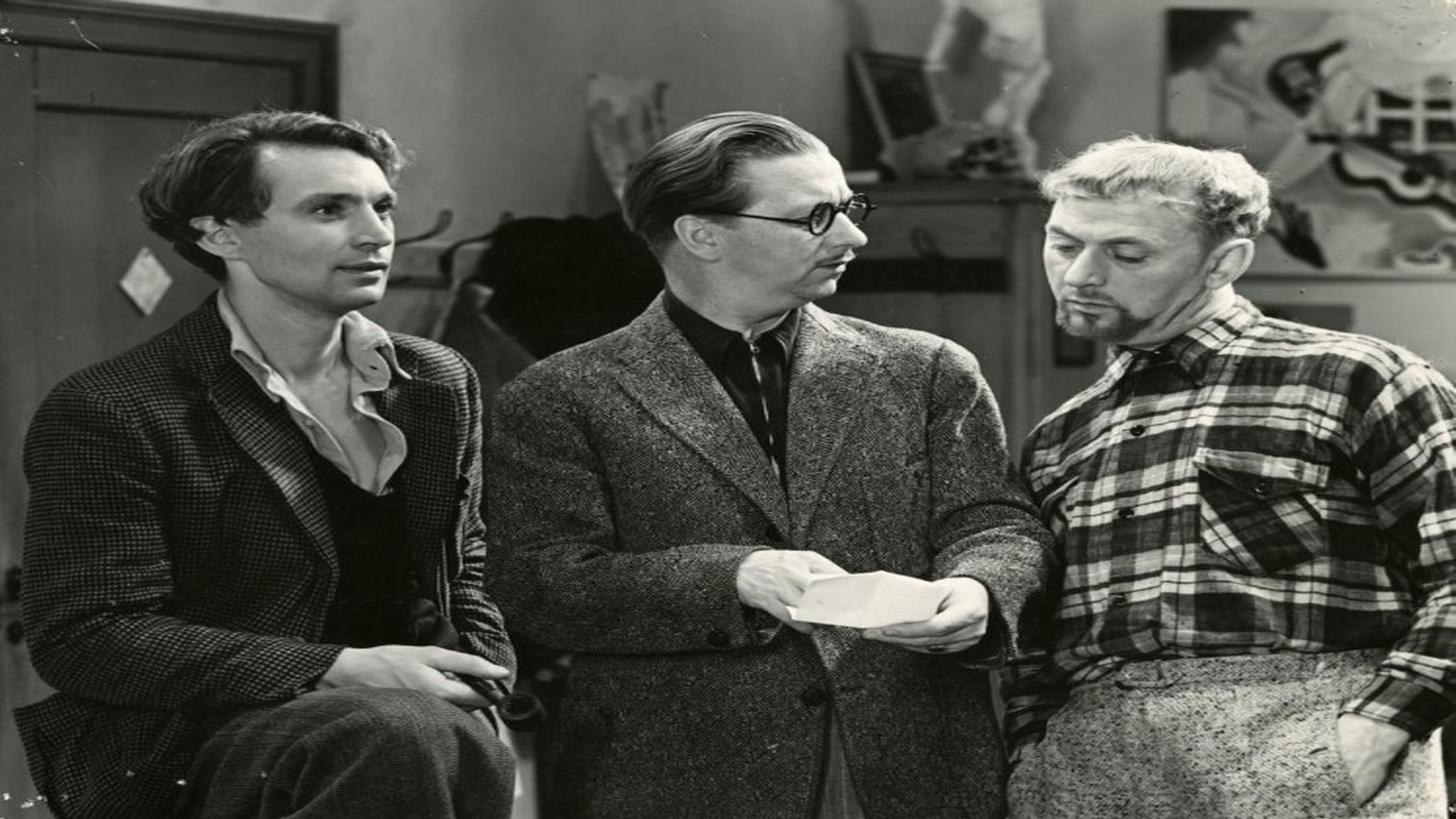 Under byens tage (1938)